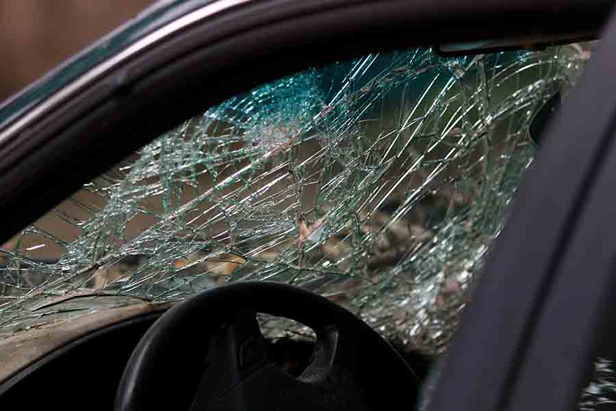 View of a car window smashed after a car accident