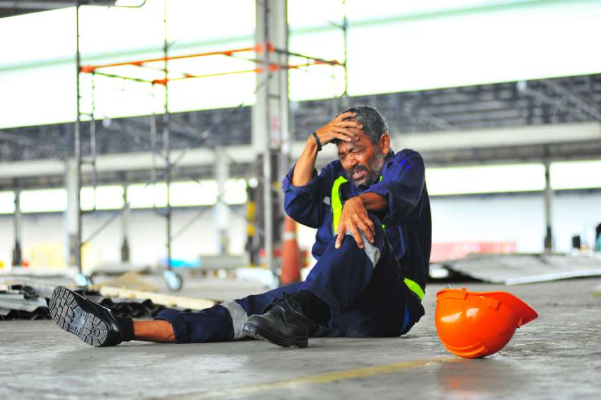 A worker at a jobsite after a fall