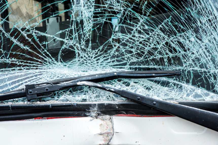 Closeup of a smashed windscreen after a bus crash