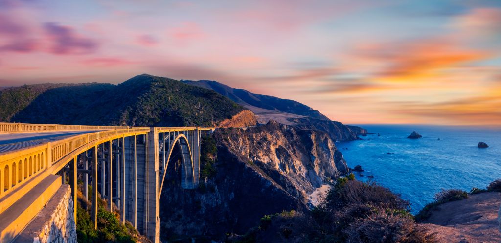 Close up of bridge rocky creek at dusk pacific coast california